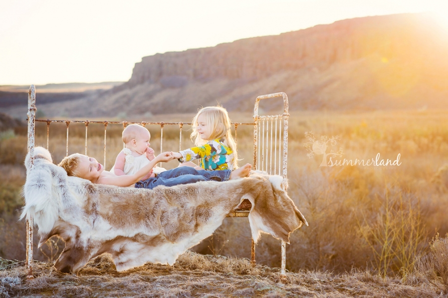 outdoor brother and sister portrait with antique bed in Moses Lake Washington